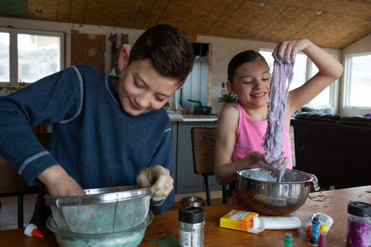 Kids mixing up the slime they made