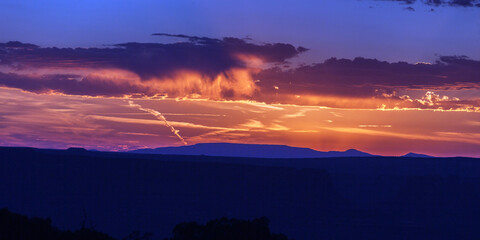 Panoramic sunset with clouds.