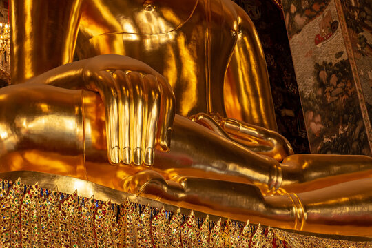 hand golden , large statue of Buddha's hand close-up photography