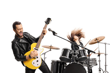 Rock band performing with a female drummer and a male guitairst