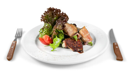 Close-up of tasty fresh salad in white plate isolated on white background
