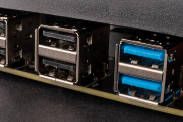 USB connectors on the computer motherboard backplate in a row of type2 and type3
