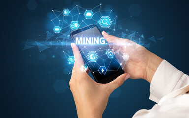 Hand using smartphone with technology concept