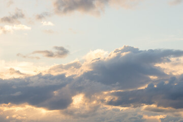 Fototapeta na wymiar sky blue background, fluffy clouds on a summer day in sunlight