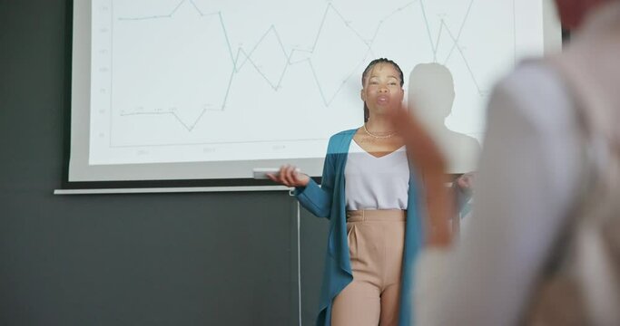 Presentation, leadership and professional black woman in the office with a screen projector. Presenter, speaker or manager training corporate employees at seminar, conference or workshop in workplace