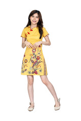 A beautiful asian woman doing a pose while wearing simple yellow chinese dress