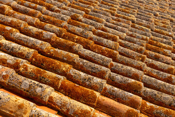 pattern of old red roof tiles