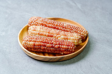 Delicious boiled waxy corn food served on the table