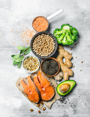 Organic food. Raw trout steaks with healthy food.