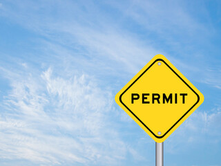 Yellow transportation sign with word permit on blue sky background