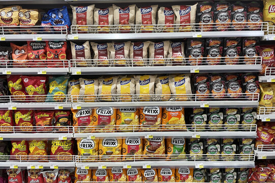 a rack with chips in a supermarket, shelves with snacks, December 2, 2022, Batumi, Georgia
