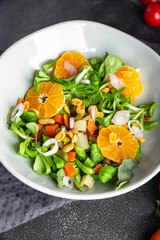 citrus salad mandarin, green leaves  fresh healthy meal food snack on the table copy space food background rustic top view 