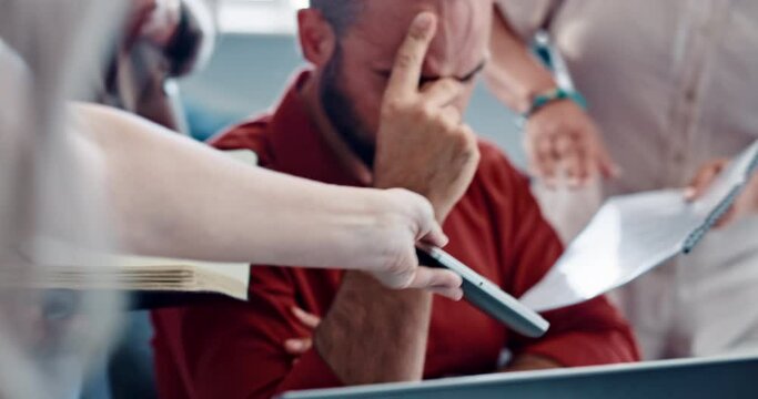 Overworked, headache and multitasking with a business man feeling pressure from a team with documents and phone. Compliance, overwhelmed or review with a frustrated or unhappy male employee and group