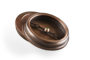 Brass antique compass isolated on white background