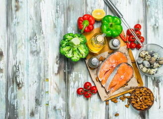 Healthy food. Salmon with honey, nuts and vegetables.