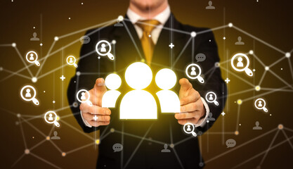 Hand holding social media icons