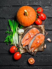 Healthy food. Salmon with organic vegetables and herbs.