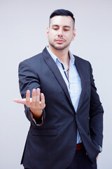 handsome man smiling hand forward.