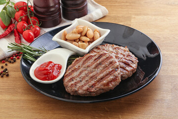 Grilled beef burger cutlet with sauce