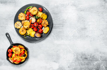 Various grilled vegetables with spices and herbs.