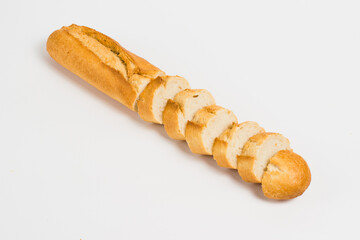 Sliced french baguette on a white background with space for text