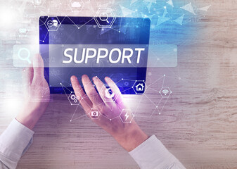 Close-up of a tablet searching inscription