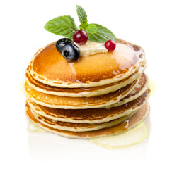 Stack of fries pancakes with fruit