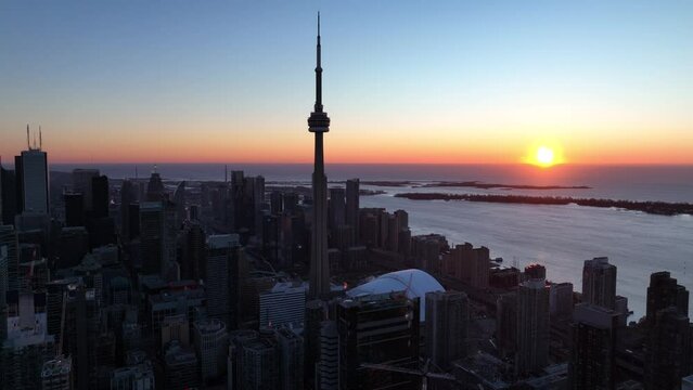 Aerial cinematic downtown Toronto CN tower sunrise 2