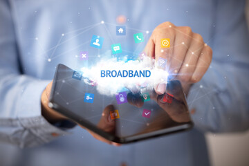 Businessman holding a foldable smartphone, technology concept