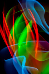 Neon Wavy Light Nightclub Background Swirls on Black Background