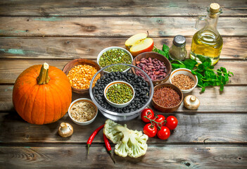 Healthy food. Healthy assortment of vegetables and fruits with legumes.
