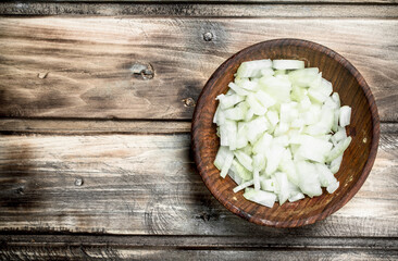 Obraz na płótnie Canvas Chopped onions in a bowl.