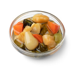 Glass bowl with Asian mixed pickled ginger and vegetables  isolated on white background close up