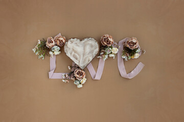 Newborn digital backdrop with basket and handmade flowers. Newborn love background. top view. 