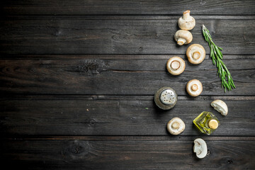 Fototapeta na wymiar Fresh mushrooms with pepper and oil.