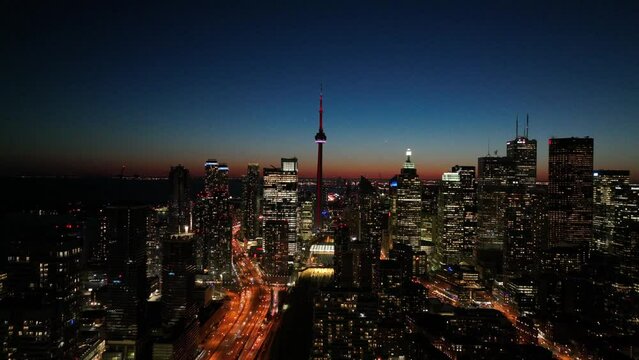 Aerial cinematic downtown Toronto QEW lakeshore sunset financial district 6