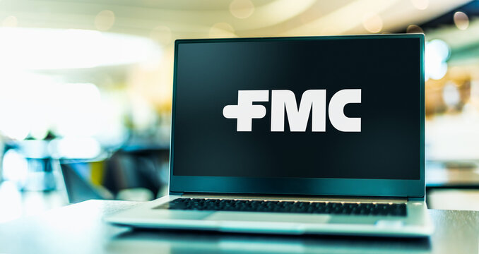 Laptop computer displaying logo of FMC Corporation