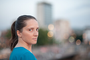 Portrait of a young woman in the city