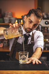 Bartender making cocktail