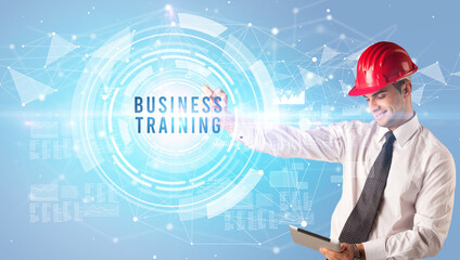 Handsome businessman with helmet drawing