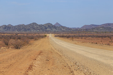 Fototapeta na wymiar Namibian landscape along the gravel road. Damaraland, homelands in South West Africa, Namibia.