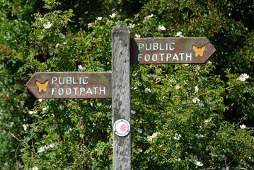 A public footpath sign in the Essex countryside, UK