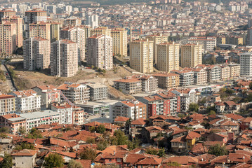 Modern property being construction alongside derelict traditional housing in Ankara, the Turkish...