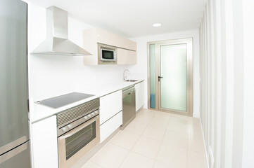 Fototapeta na wymiar modern kitchen decorated with white appliances