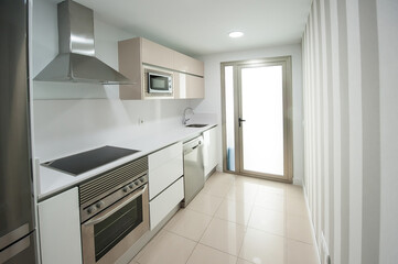 modern kitchen decorated with white appliances