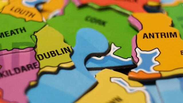 Ireland Map Puzzle Blocks with Irish Cities Belfast, Dublin, Cork, etc. Close-Up Video Background, Dolly Footage.