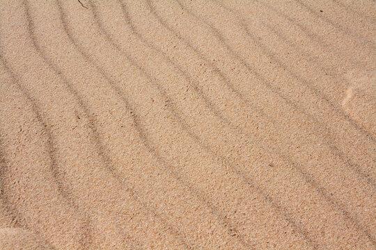 Background with waves of sand macro photography