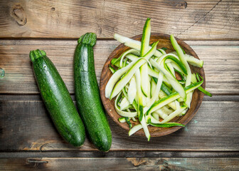 Pieces of zucchini in bowl.