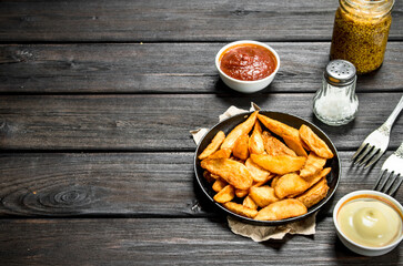 Baked potato slices with different sauces.