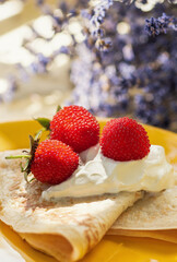 Pancakes with sour cream decorated with berries